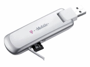 the T-Mobile Jet laptop stick with the memory card cover open on the side of the device and a memory card being inserted
